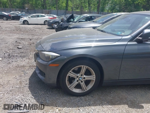 2014 BMW 3 Series 320i xDrive with VIN WBA3C3C57EP662795, listed as a IAAI auction lot 42267683 with 153,451 mi miles and . Bid and sale history available at DreamBid. Image 18.