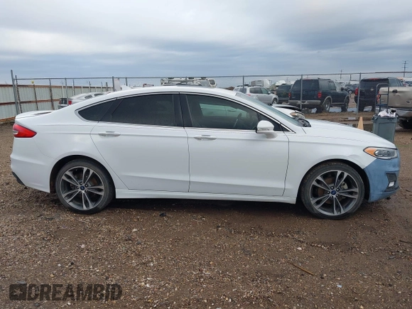 2019 Ford Fusion Titanium with VIN 3FA6P0D93KR138574, listed as a IAAI auction lot 41967094 with 118,297 mi miles. Bid and sale history available at carsss.com. Image 13.