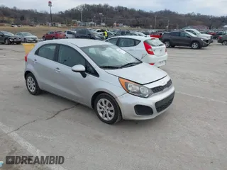 2013 Kia Rio LX with VIN KNADM5A30D6226681, listed as a IAAI auction lot 41657362 with 127,569 mi miles. Bid and sale history available at carsss.com. Image 1.