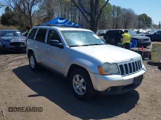2010 Jeep Grand Cherokee Laredo with VIN 1J4PR4GKXAC141526, listed as a IAAI auction lot 41997559 with 0 mi miles. Bid and sale history available at carsss.com. Image 1.