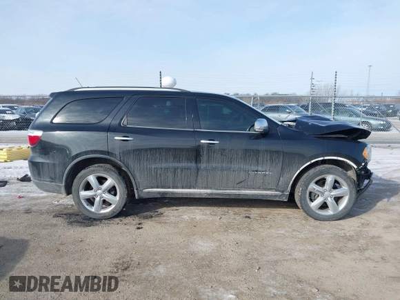 2013 Dodge Durango Citadel with VIN 1C4SDJET1DC505202, listed as a IAAI auction lot 41613403 with 148,424 mi miles and . Bid and sale history available at carsss.com. Image 14.