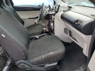 2012 Scion iQ z VIN JTNJJXB05CJ017720, wystawiony jako Copart lot #56152325 z przebiegiem 164 031 mil mil oraz Szkoda całkowita • Salvage title. Historia ofert i sprzedaży dostępna na DreamBid. Obrazek 7.