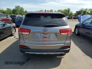 2017 Kia Sorento EX z VIN 5XYPHDA56HG232245, wystawiony jako Copart lot #56305625 z przebiegiem 76 947 mil mil oraz Szkoda całkowita • Salvage title. Historia ofert i sprzedaży dostępna na DreamBid. Obrazek 6.