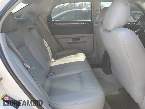 2005 Chrysler 300 with VIN 2C3AA63H35H504149, listed as a Copart auction lot 46455655 with 128,617 mi miles and Salvage Title. Bid and sale history available at carsss.com. Image 10.
