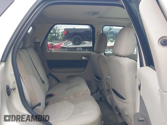 2010 Mercury Mariner with VIN 4M2CN8B73AKJ05123, listed as a IAAI auction lot 42512923 with 240,736 mi miles and . Bid and sale history available at DreamBid. Image 8.