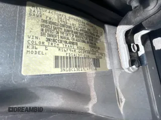 2009 Nissan Versa S with VIN 3N1BC13E19L499018, listed as a Copart auction lot 56711385 with 196,451 mi miles and Clean Title. Bid and sale history available at DreamBid. Image 10.