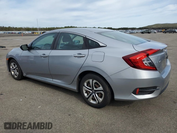 2017 Honda Civic LX z VIN 2HGFC2F52HH551152, wystawiony jako Copart lot #52728275 z przebiegiem 64 376 mil mil oraz Szkoda całkowita • Salvage title. Historia ofert i sprzedaży dostępna na DreamBid. Obrazek 2.