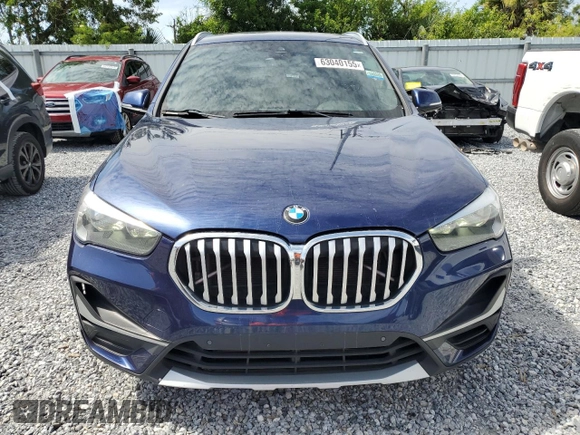 2020 BMW X1 xDrive28i with VIN WBXJG9C0XL5R33141, listed as a Copart auction lot 63040155 with 165,172 mi miles and Clean title. Bid and sale history available at DreamBid. Image 5.