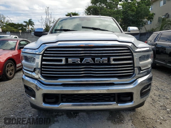 2020 Ram 2500 Laramie with VIN 3C6UR5NL8LG313893, listed as a Copart auction lot 42675764 with 128,135 mi miles and Salvage Title. Bid and sale history available at carsss.com. Image 5.