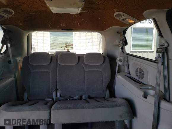 2005 Dodge Caravan SXT with VIN 2D4GP44L65R120861, listed as a Copart auction lot 57040565 with 244,971 mi miles and Salvage title. Bid and sale history available at DreamBid. Image 10.