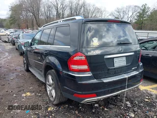 2012 Mercedes-Benz GL-Class GL 450 with VIN 4JGBF7BE8CA796841, listed as a IAAI auction lot 41569965 with 179,815 mi miles. Bid and sale history available at carsss.com. Image 3.