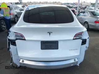 2024 Tesla Model Y Long Range with VIN 7SAYGDEE5RA222333, listed as a IAAI auction lot 41944404 with 12,176 mi miles. Bid and sale history available at carsss.com. Image 17.