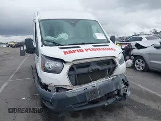 2021 Ford Transit Cargo z VIN 1FTBR1C87MKA81434, wystawiony jako IAAI lot #41759890 z przebiegiem 221 227 mil mil oraz . Historia ofert i sprzedaży dostępna na DreamBid. Obrazek 12.