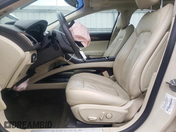 2014 Lincoln MKZ Hybrid with VIN 3LN6L2LU4ER808818, listed as a Copart auction lot 57411395 with 95,775 mi miles and Salvage title. Bid and sale history available at DreamBid. Image 7.