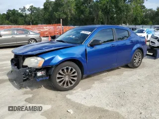 2014 Dodge Avenger SE z VIN 1C3CDZAB8EN189954, wystawiony jako Copart lot #57937835 z przebiegiem 232 035 mil mil oraz Szkoda całkowita • Salvage title. Historia ofert i sprzedaży dostępna na DreamBid. Obrazek 1.