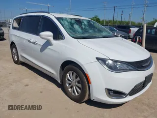 2018 Chrysler Pacifica Touring L z VIN 2C4RC1BG1JR142797, wystawiony jako IAAI lot #42027910 z przebiegiem 158 094 mil mil oraz . Historia ofert i sprzedaży dostępna na DreamBid. Obrazek 1.