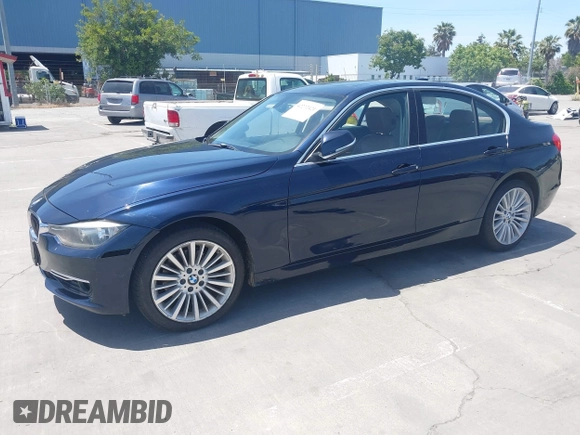 2012 BMW 3 Series 328i with VIN WBA3A5G59CNP16943, listed as a IAAI auction lot 42272421 with 195,089 mi miles and . Bid and sale history available at DreamBid. Image 2.