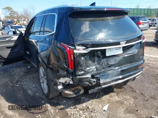 2023 Cadillac XT6 AWD Premium Luxury with VIN 1GYKPDRS8PZ153838, listed as a IAAI auction lot 41838527 with 60,034 mi miles and . Bid and sale history available at DreamBid. Image 6.