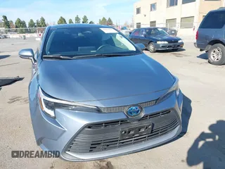 2023 Toyota Corolla Hybrid LE with VIN JTDBCMFEXP3006343, listed as a IAAI auction lot 41056503 with 121,690 mi miles. Bid and sale history available at carsss.com. Image 12.