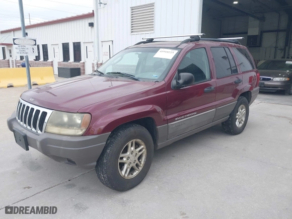 2003 Jeep Grand Cherokee Laredo with VIN 1J4GW48S83C563627, listed as a IAAI auction lot 41910225 with 150,264 mi miles. Bid and sale history available at carsss.com. Image 2.