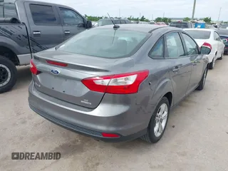 2014 Ford Focus SE with VIN 1FADP3F27EL139920, listed as a IAAI auction lot 42024617 with 143,223 mi miles and . Bid and sale history available at DreamBid. Image 4.