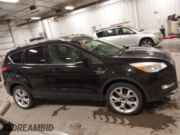 2014 Ford Escape Titanium with VIN 1FMCU9J95EUD85537, listed as a IAAI auction lot 41472236 with 154,796 mi miles. Bid and sale history available at carsss.com. Image 13.