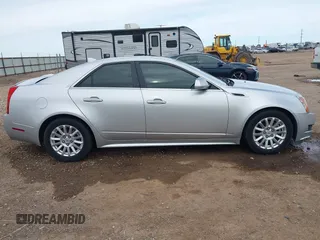2013 Cadillac CTS Luxury with VIN 1G6DH5E58D0102036, listed as a IAAI auction lot 42270393 with 133,203 mi miles and . Bid and sale history available at DreamBid. Image 13.