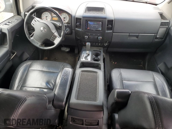 2012 Nissan Titan SV with VIN 1N6BA0EK4CN319941, listed as a Copart auction lot 43640705 with 210,885 mi miles and Salvage Title. Bid and sale history available at DreamBid. Image 8.