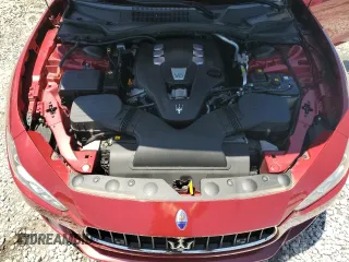 2014 Maserati Ghibli z VIN ZAM57XSA7E1126742, wystawiony jako Copart lot #57495135 z przebiegiem 50 077 mil mil oraz Szkoda całkowita • Salvage title. Historia ofert i sprzedaży dostępna na DreamBid. Obrazek 11.