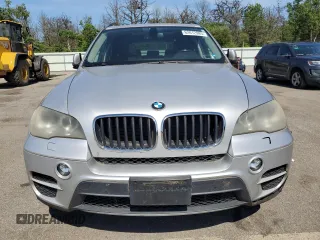 2012 BMW X5 35i with VIN 5UXZV4C5XCL749204, listed as a Copart auction lot 62012985 with 94,636 mi miles and Clean title. Bid and sale history available at DreamBid. Image 5.