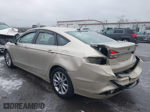 2017 Ford Fusion SE with VIN 3FA6P0HDXHR412215, listed as a IAAI auction lot 41520106 with 100,001 mi miles. Bid and sale history available at carsss.com. Image 3.