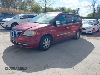 2012 Chrysler Town & Country Touring-L with VIN 2C4RC1CG6CR144174, listed as a IAAI auction lot 42003682 with 172,453 mi miles. Bid and sale history available at carsss.com. Image 2.