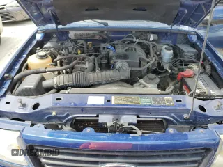 2009 Ford Ranger XL z VIN 1FTYR10D49PA41222, wystawiony jako Copart lot #58270355 z przebiegiem 142 903 mil mil oraz Szkoda całkowita • Salvage title. Historia ofert i sprzedaży dostępna na DreamBid. Obrazek 11.