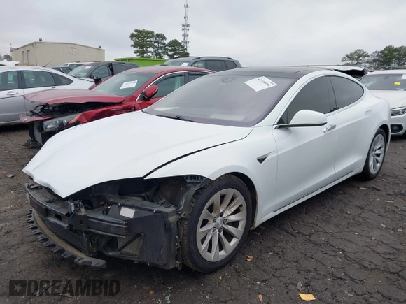 2016 Tesla Model S 90D with VIN 5YJSA1E26GF155962, listed as a IAAI auction lot 41348998 with 134,269 mi miles and . Bid and sale history available at DreamBid. Image 19.