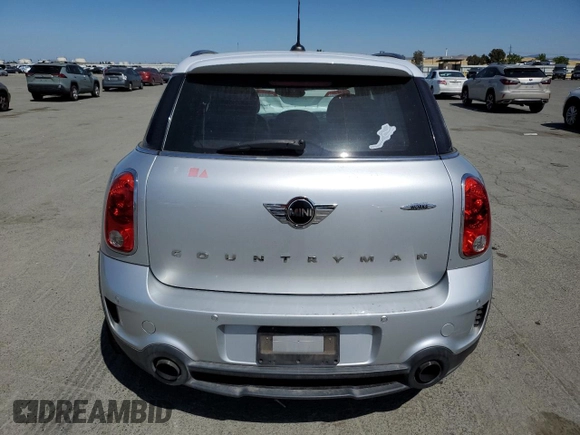 2014 MINI Countryman John Cooper Works with VIN WMWXD1C54EWS34594, listed as a Copart auction lot 55201045 with 94,899 mi miles and Salvage Title. Bid and sale history available at DreamBid. Image 6.