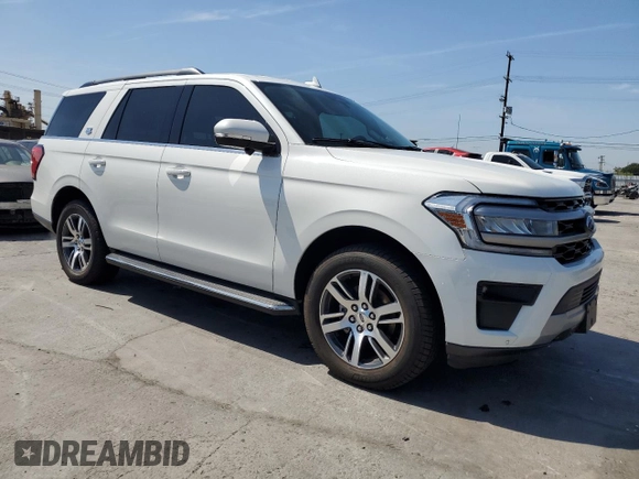 2022 Ford Expedition XLT with VIN 1FMJU1JT5NEA51183, listed as a Copart auction lot 54157545 with 32,969 mi miles and Salvage Title. Bid and sale history available at carsss.com. Image 4.