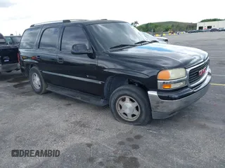 2003 GMC Yukon SLT with VIN 1GKEC13V93R206741, listed as a IAAI auction lot 41682800 with 346,156 mi miles. Bid and sale history available at carsss.com. Image 1.
