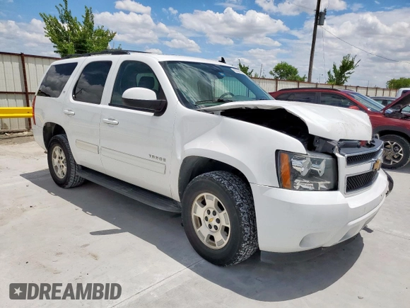 2014 Chevrolet Tahoe LT with VIN 1GNSCBE07ER239575, listed as a Copart auction lot 63094525 with 142,467 mi miles and Salvage title. Bid and sale history available at DreamBid. Image 4.
