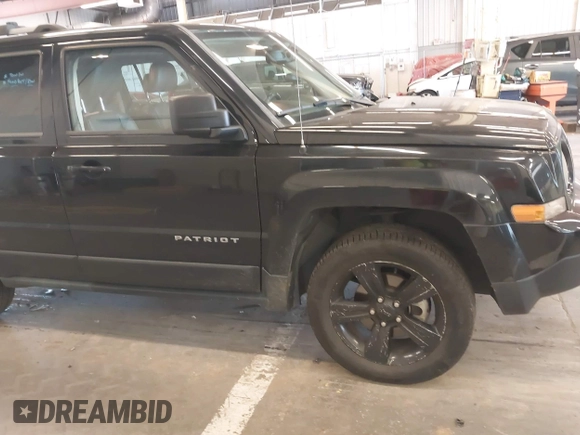 2014 Jeep Patriot Limited with VIN 1C4NJRCB4ED629085, listed as a IAAI auction lot 39414215 with 87,409 mi miles. Bid and sale history available at carsss.com. Image 16.