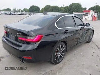 2020 BMW 3 Series 330i with VIN 3MW5R1J0XL8B00985, listed as a IAAI auction lot 42300540 with 50,732 mi miles and . Bid and sale history available at DreamBid. Image 4.