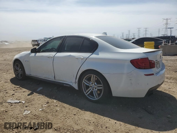 2013 BMW 5 Series 550i xDrive with VIN WBAFU9C52DDY71651, listed as a Copart auction lot 52156465 with 144,211 mi miles and Salvage title. Bid and sale history available at DreamBid. Image 2.