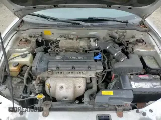 2001 Hyundai Tiburon с VIN KMHJG35F31U224416, выставлен на аукционе Copart как лот 83243684 с пробегом 59 473 миль миль и Списание • Salvage title. История ставок и продаж доступна на DreamBid. Изображение 12.