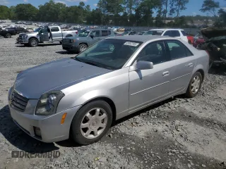 2004 Cadillac CTS with VIN 1G6DM577140143103, listed as a Copart auction lot 52082795 with 137,393 mi miles and Salvage title. Bid and sale history available at DreamBid. Image 1.
