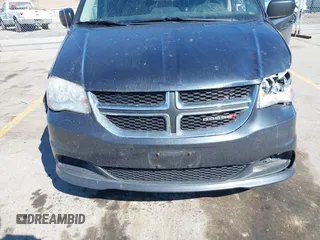 2014 Dodge Grand Caravan SXT with VIN 2C4RDGCG1ER167624, listed as a IAAI auction lot 41888822 with 202,729 mi miles and . Bid and sale history available at DreamBid. Image 6.