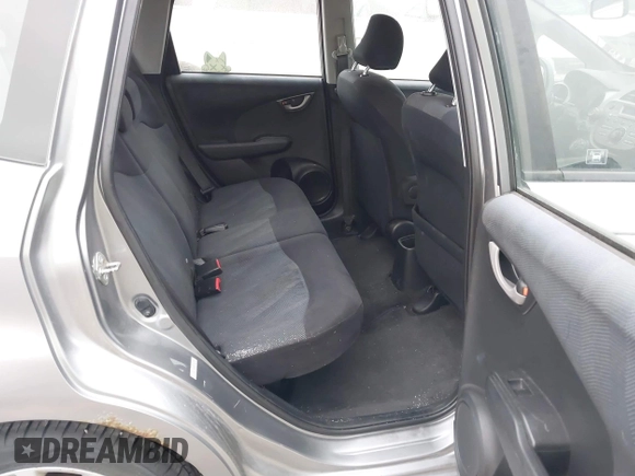 2009 Honda Fit Sport with VIN JHMGE88469S063030, listed as a IAAI auction lot 42064670 with 156,791 mi miles. Bid and sale history available at carsss.com. Image 8.