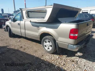 2004 Ford F-150 XL with VIN 1FTRF12W94NA93705, listed as a IAAI auction lot 41965446 with 209,097 mi miles. Bid and sale history available at carsss.com. Image 3.