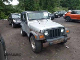2006 Jeep Wrangler Sport z VIN 1J4FA49S76P710641, wystawiony jako IAAI lot #42448817 z przebiegiem 191 815 mil mil oraz . Historia ofert i sprzedaży dostępna na DreamBid. Obrazek 1.