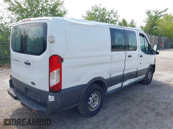 2015 Ford Transit Cargo z VIN 1FTNE1ZM4FKB15801, wystawiony jako IAAI lot #42674219 z przebiegiem 228 634 mil mil oraz . Historia ofert i sprzedaży dostępna na DreamBid. Obrazek 4.