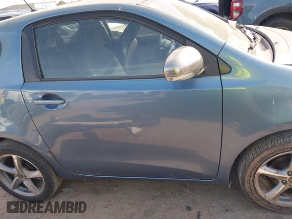 2012 Scion iQ with VIN JTNJJXB09CJ019082, listed as a IAAI auction lot 41798707 with 120,628 mi miles. Bid and sale history available at carsss.com. Image 14.