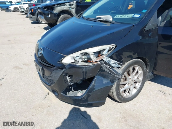 2012 Mazda Mazda5 Grand Touring with VIN JM1CW2DLXC0138533, listed as a IAAI auction lot 41609270 with 263,625 mi miles. Bid and sale history available at carsss.com. Image 6.